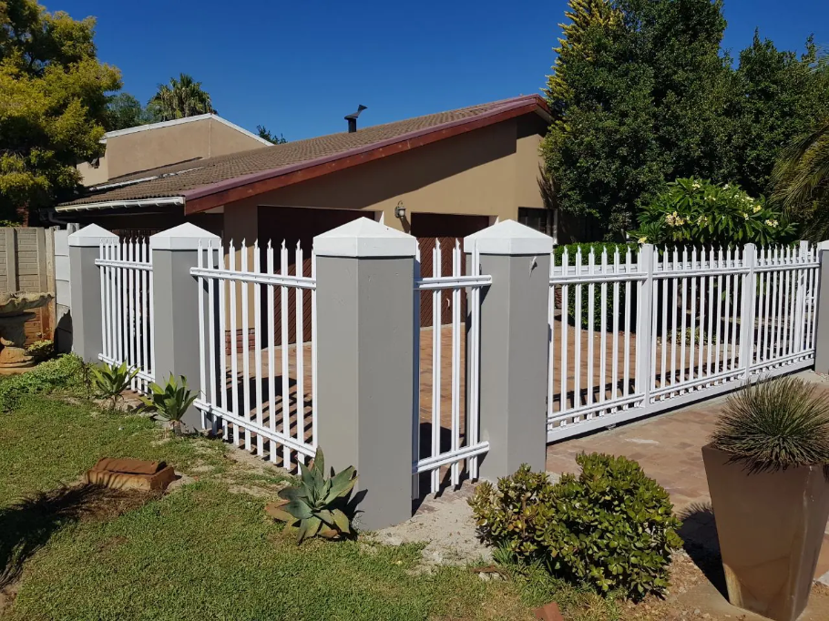 White Powdercoated Palisade Panels πΈ white w-shaped palisade panels installed at residential driveway in South Africa